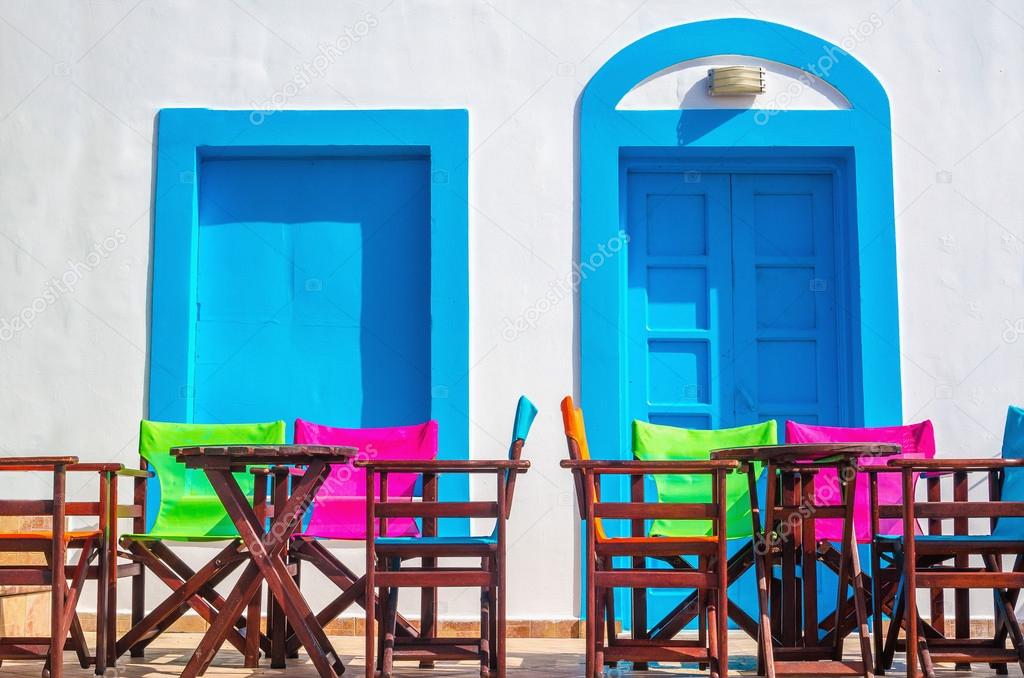 Colorful Greek restaurant table and chairs, Greece