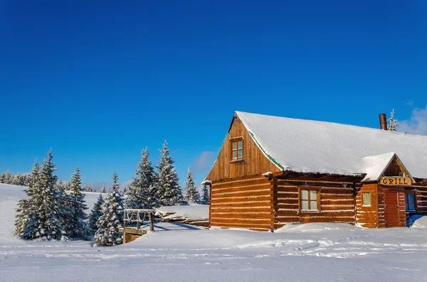 Wooden grill-barbeque house with fresh snow — Stock Photo, Image