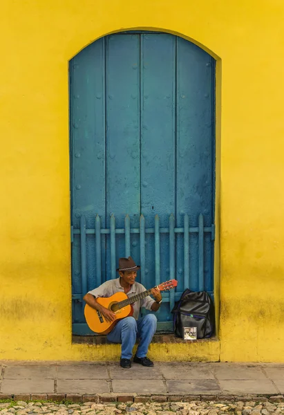 Man playing the guitar