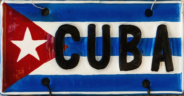 Bandera cubana roja-azul-blanca sobre placa metálica — Foto de Stock