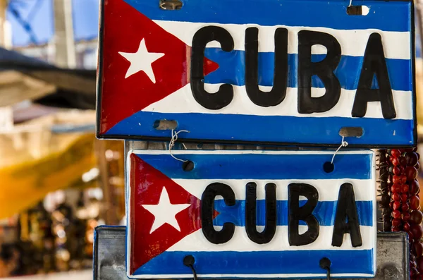 Bandera cubana roja-azul-blanca sobre placas metálicas — Foto de Stock