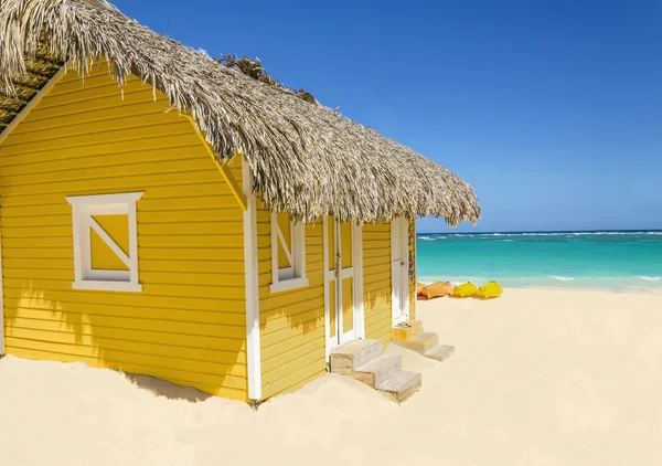 Wooden yellow beach cottage — Stock Photo, Image