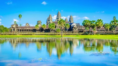 Angkor Wat temple and palms reflection, Cambodia clipart