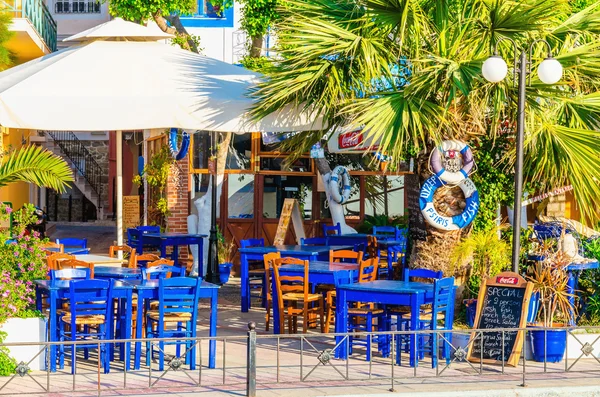 Blue wooden tables in Greek restaurant — Stock Photo, Image