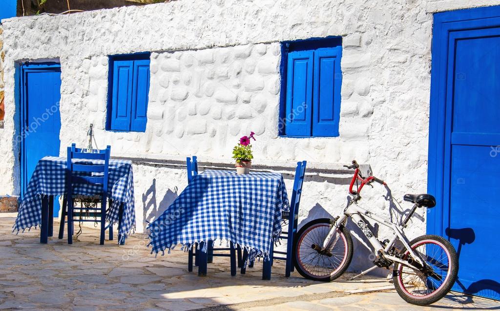 Typical Greek restaurant with blue tables