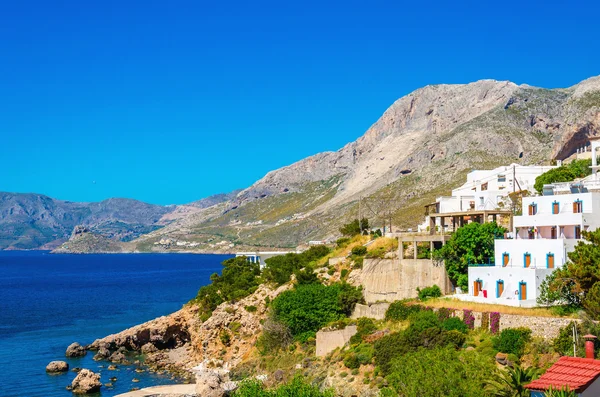 Typical Greek houses on coast of Aegean Sea Greece — Stock Photo, Image