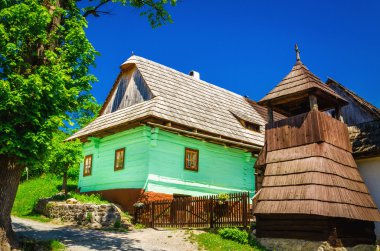 Wooden green hut and belfry