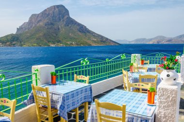 Greek restaurant with teracce and sea, Greece clipart