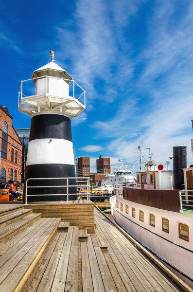 Small black and white lighthouse in Oslo, Norway