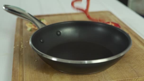 Removing Peppers Frying Pan Wooden Spoon While Frying Kitchen Concept — Stock Video