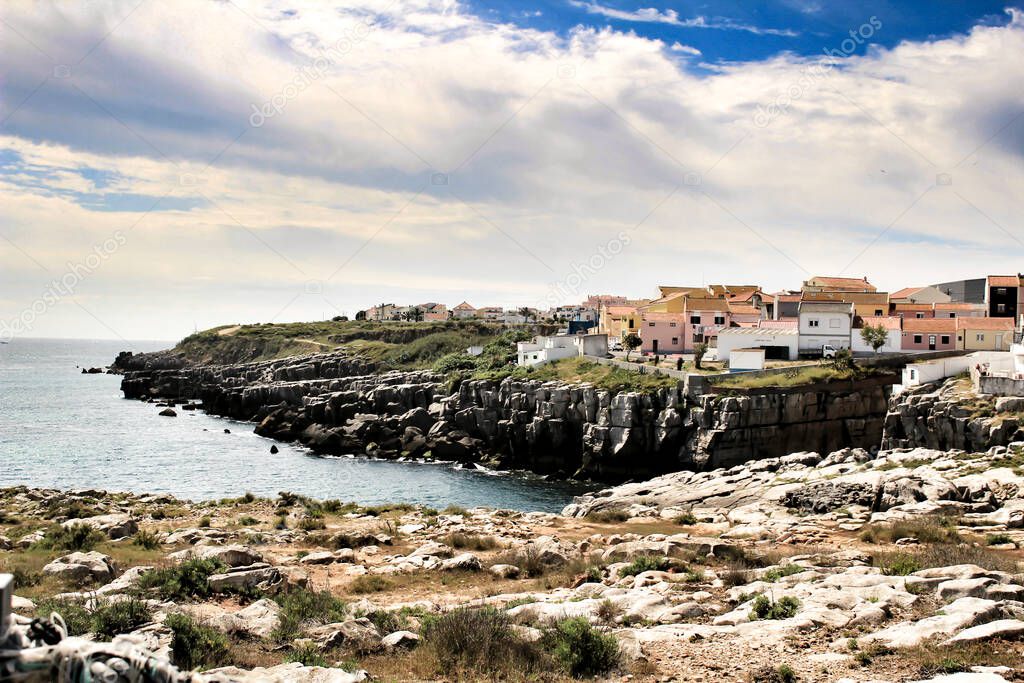 Views of the Peniche village and wild Atlantic Ocean with beautiful cliffs and beaches in Portugal