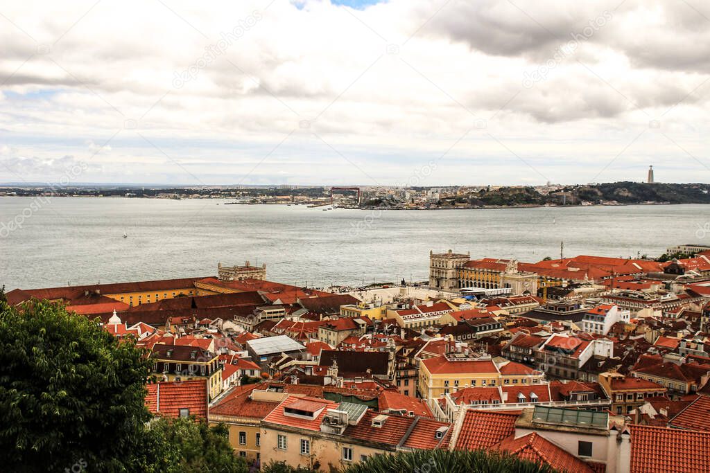 Panoramic of Lisbon city from Saint George Castle on a cloudy day in Spring