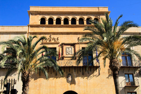 Main facade of the town hall of Elche in a sunny day of Spring