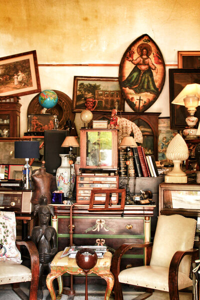 Lisbon, Portugal- May 28, 2018: Small antique shop with a lot of articles in Lisbon, Portugal