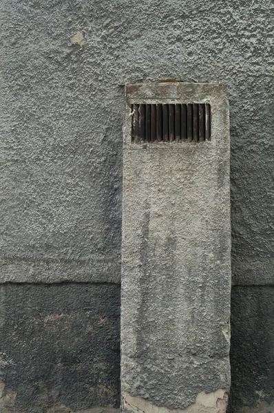 Ventilation pipe on a gray wall — Stock Photo, Image