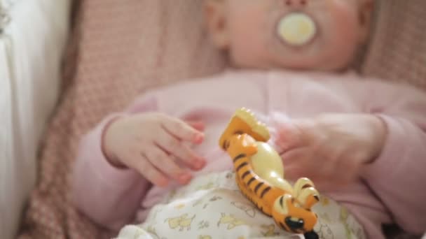 Cute little baby with pacifier. — Stock Video