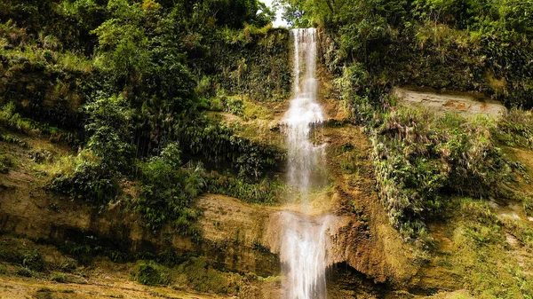 Beautiful tropical waterfall. Can-umantad Falls, Bohol, Philippines.