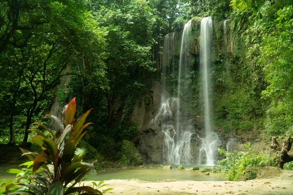 Beautiful tropical waterfall. Kawasan Falls, Bohol, Philippines.