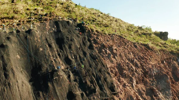 Rockfall protection netting, safety wire mesh in the mountains — Stock Photo, Image