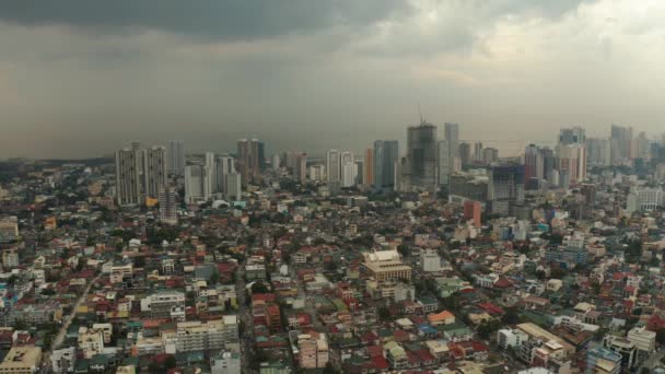 Manila city with skyscrapers, Philippines aerial view. — Stock Video