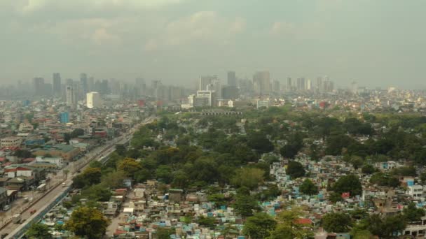 Manila city with skyscrapers, Philippines aerial view. — Stock Video