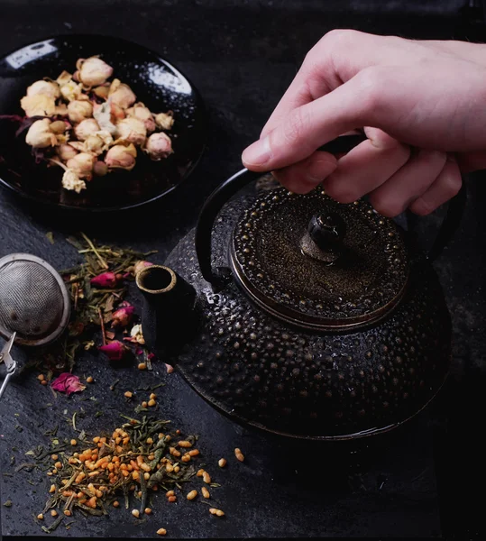 Variety of dry tea with teapot — Stock Photo, Image