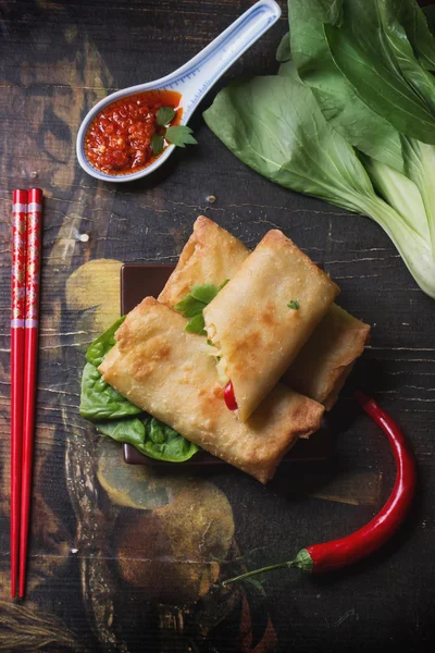 Fried spring rolls with  shrimps, bok choi, chili pepper and hot — Stock Photo, Image