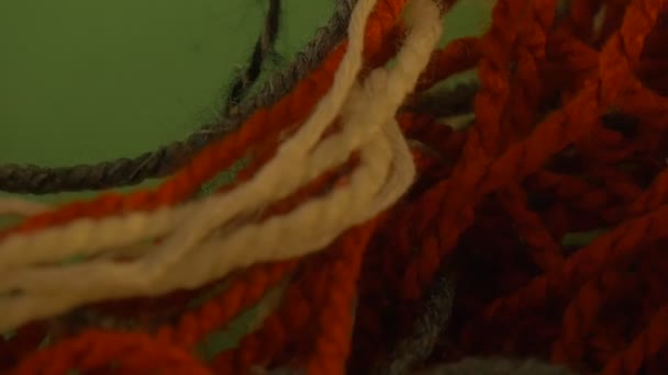 Colored Yarn Wool is Moving on Green Screen Someone Moves the Colorful Threads of Wool Someone is Putting the Heap of Thread Down Removes it Takes Down — Stock Video