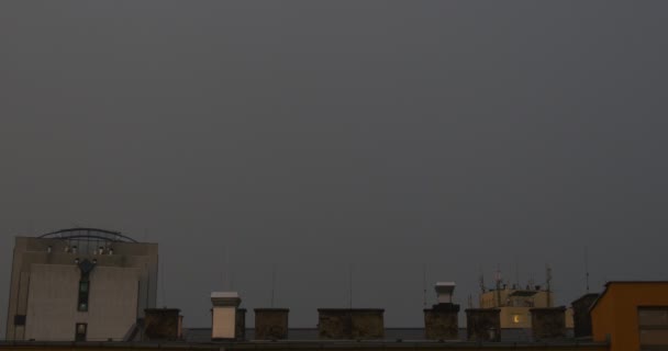 Roofs of Apartment Houses and Flash of Lightning Are Shown on Video — Stock Video