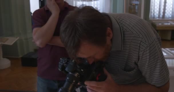 Two Cameramen are Taking Video of Nestor The Chronicler's Book "The Tale of Bygone Years", Paterik Kievo-Pechersky — Stock Video