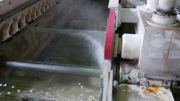 Glass Sheet is Washed by Water, Hose, Water Jet, Worker in Yellow Safety Gloves Took the Sheet Out, Chamfering Machine, Glass Edge Grinding — Stock Video