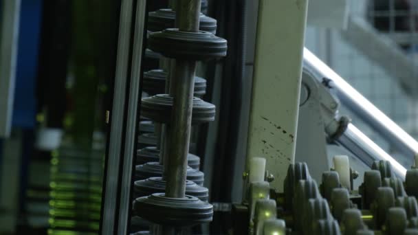 Machine Wheels, Running Machine, Worker at the Machine, Man is Observing the Running Machine — Stock Video