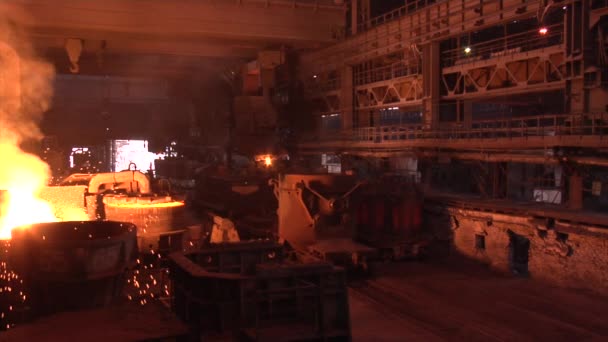 Boiling Metal in The Steel Vessel Orange Light Wagons are Transporting Ore Factory Equipment — Stock Video