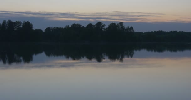 Smooth Water Closeup, Horizon, Trees 'Silhouettes, Light Sky, Horizon, Twilight, Evening, Pond, Landscape — стоковое видео