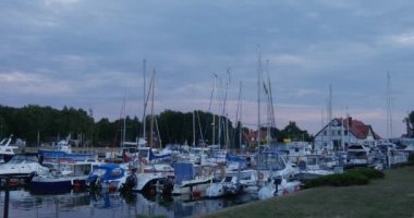 Yachts Are Laid Up Yacht Club Port Harbor Calm Clear Water Green Trees Grass Cloudy Sky Summer Evening Leba Poland