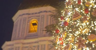 Rotating Decorated Fir-Tree Installed at Sofia Square at the Clock Tower Man Cookie Toys Balls Lights Garlands on a Tree New Year's Celebration Kiev