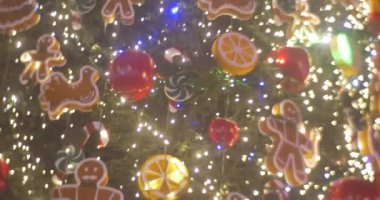Rotating Decorated Fir-Tree Installed at Sofia Square Man Cookie Toys Balls Lights Garlands on a Tree Star on a Top New Year's Celebration Kiev Ukraine