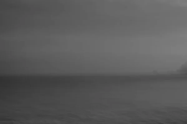 Κίνηση Στην Παραλία Θολώνει Την Αφηρημένη Άμμο Και Κύματα Που — Φωτογραφία Αρχείου