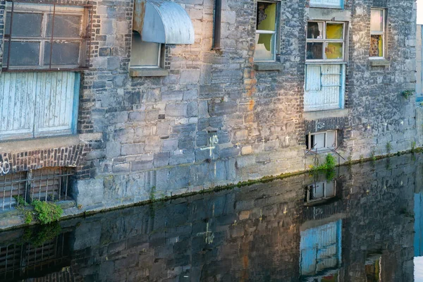 Derelict Industrial Reflection Closeup Stone Wall Broken Windows Doors Edge — Stock Photo, Image