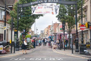 Roman Road, East London on Market day. clipart
