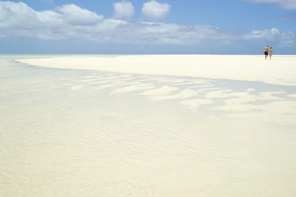 White tropical sand stretching to horizon — Stock Photo, Image