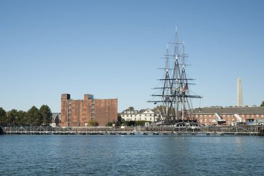 Boston Harbor, USS Constitution is a wooden-hulled, three-masted historic frigate