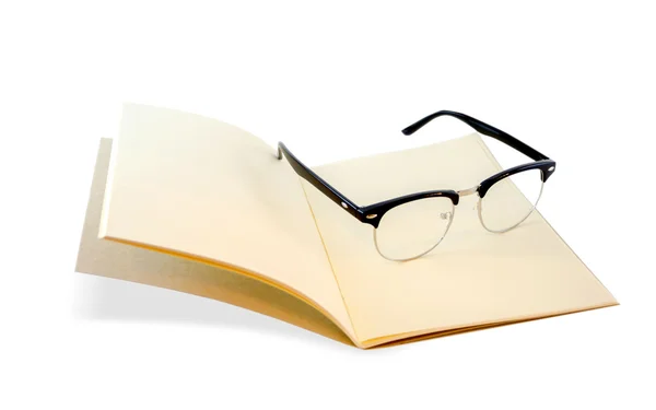 Brown notebook openned and eye glasses isolated — Stock Photo, Image