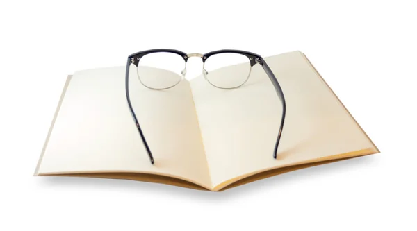 Cuaderno marrón abierto y gafas de ojo hipster mirada aislada — Foto de Stock