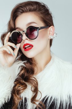 model wearing artificial fur coat