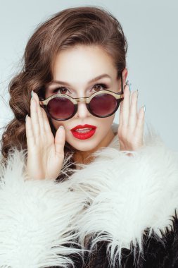 model wearing artificial fur coat