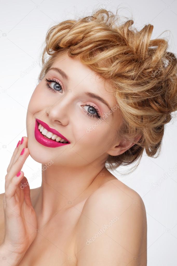 Woman With Blonde Hair And Stylish Hairstyle Stock Photo