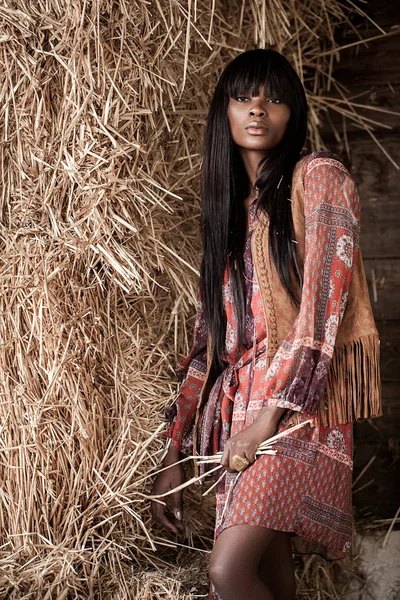 Woman posing near the haystacks — Stock Photo, Image