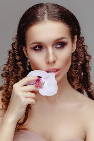 model posing with flower