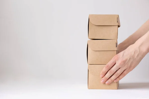 Kraft cardboard boxes, food or clothing delivery, modern ways to buy food with delivery